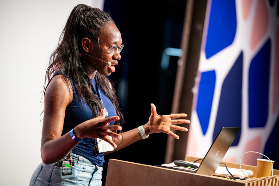 Woman speaking on stage at Codegarden